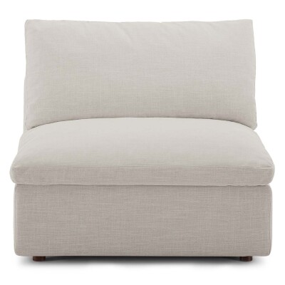 A light beige couch with a white cushion.