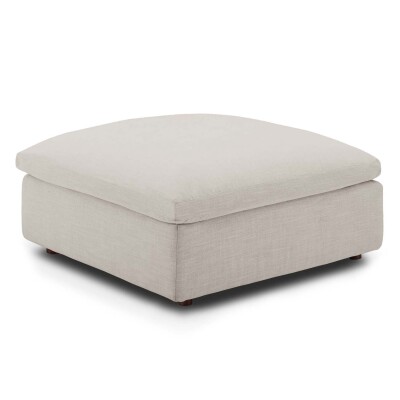 A light beige ottoman on a white background.