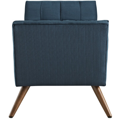 A blue upholstered chair with wooden legs.