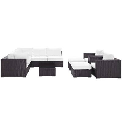 A black and white wicker sectional sofa set.