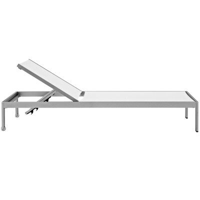 A metal chaise lounge on a white background.