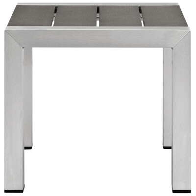 A stainless steel side table with a gray slatted top.
