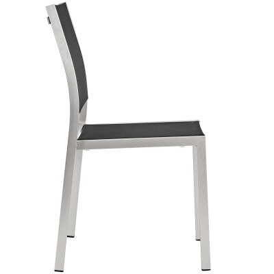 A silver and black dining chair on a white background.