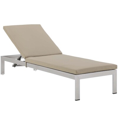 A chaise lounger with a beige cushion on a white background.
