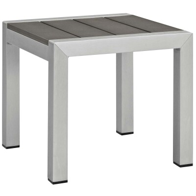 A silver side table with gray slats.