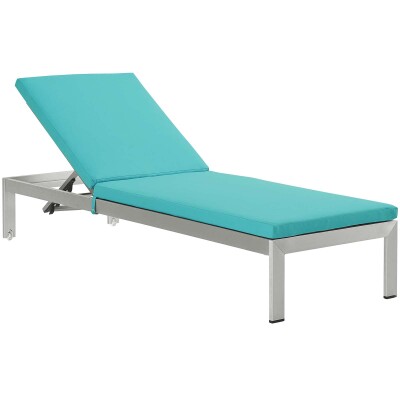 A blue chaise lounger with a metal frame.