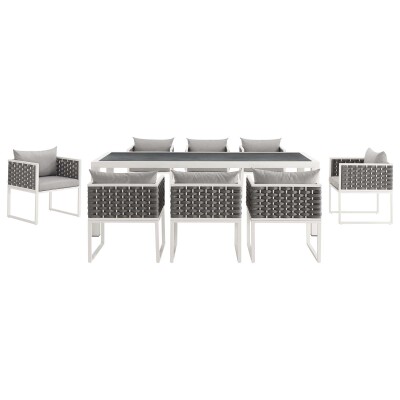 A white and grey outdoor dining set with six chairs.