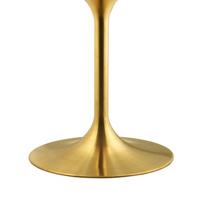 A gold dining table on a white background.