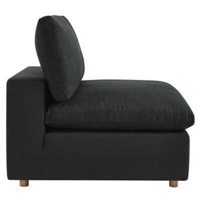 A black couch with a wooden base.