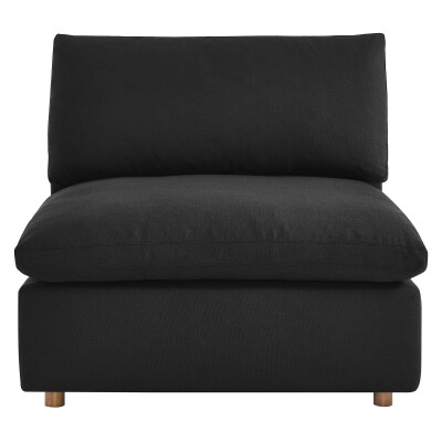 A black upholstered chair with wooden legs.