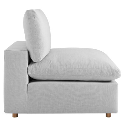 An image of a white couch with a wooden base.
