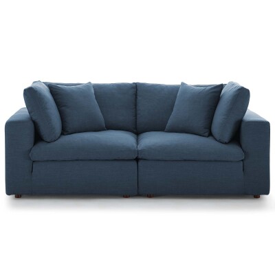 A blue couch on a white background.
