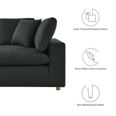An image of a black couch with different features.