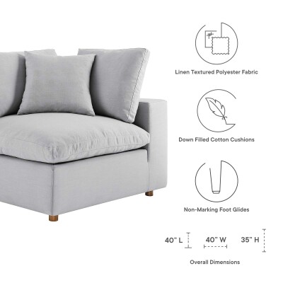 A sectional sofa with a grey fabric and instructions.