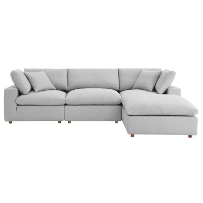A light grey sectional sofa with a chaise.