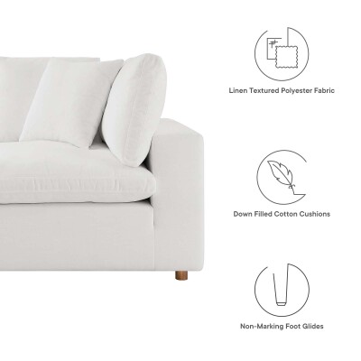 An image of a white couch with different features.