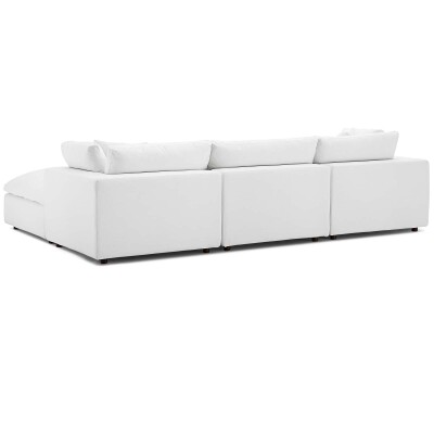 A white sectional sofa on a white background.