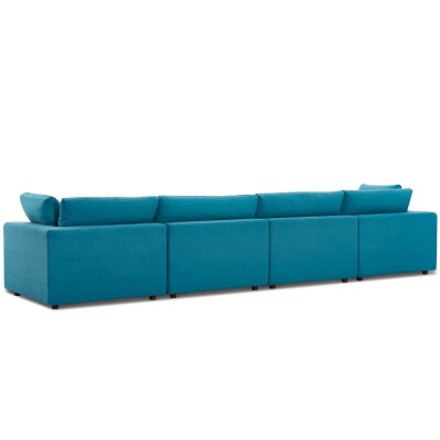 A blue sectional sofa on a white background.