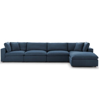 A blue sectional sofa with a chaise.