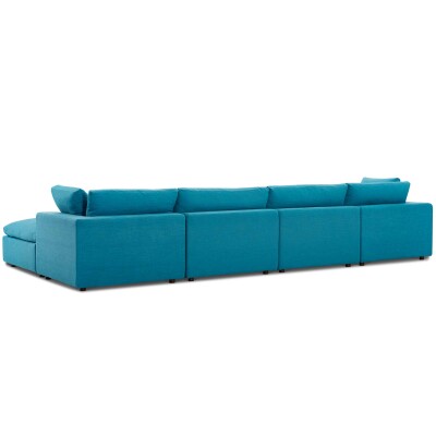A blue sectional sofa with a chaise.