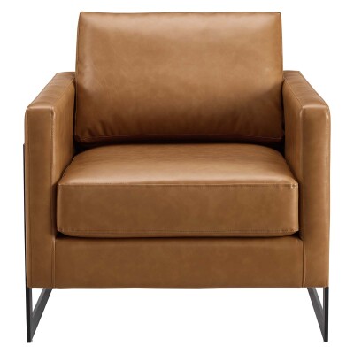 A tan leather chair with metal legs.