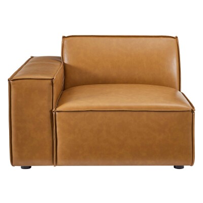 A tan leather chair with an armrest.