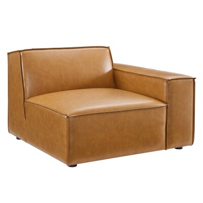 A tan leather chair with an armrest.