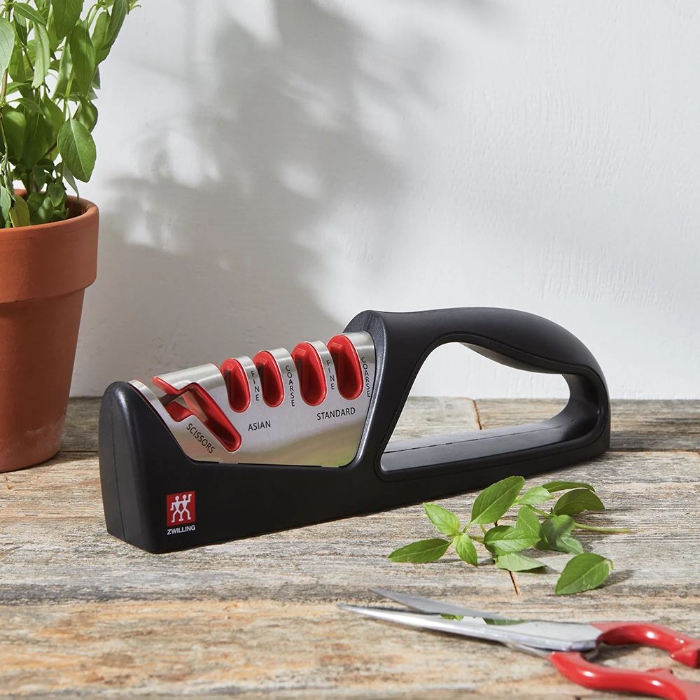 https://www.homethreads.com/files/zwilling/1010831-zwilling-razor-sharp-4-stage-pull-through-knife-sharpener-with-shear-sharpener-german-engineered-informed-by-100-years-of-mastery-2.webp