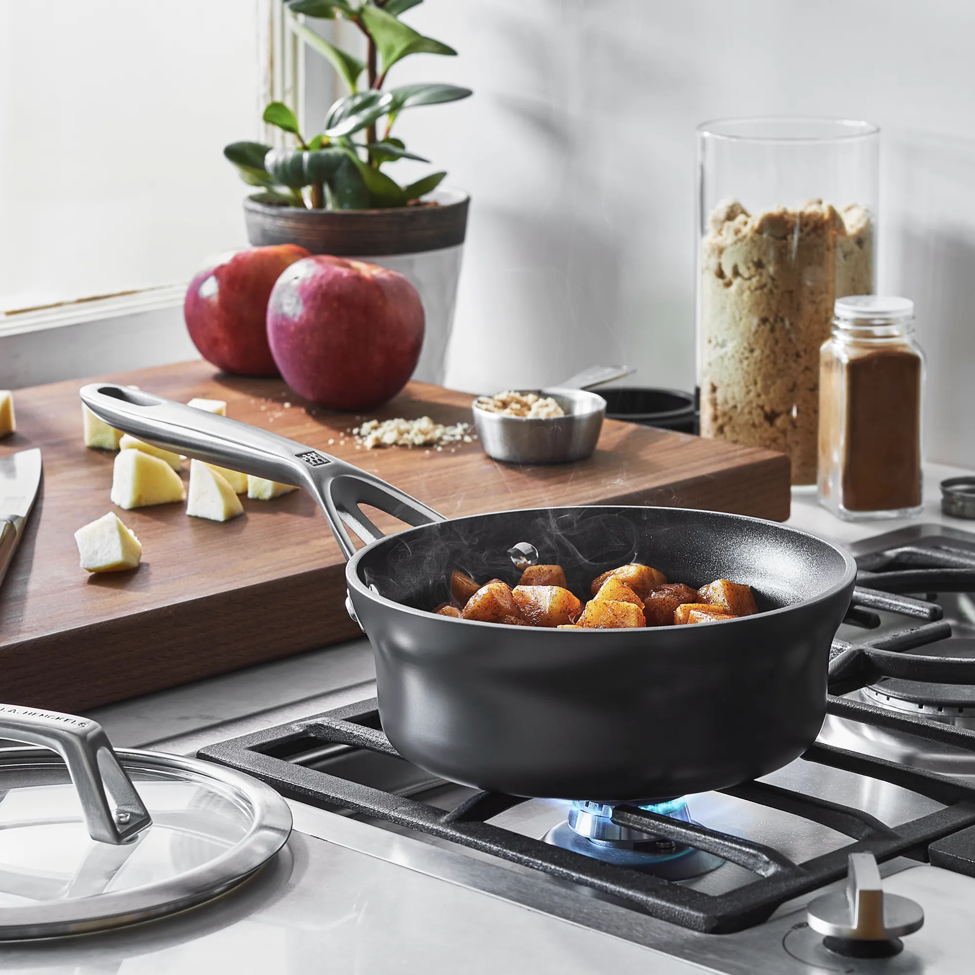 https://www.homethreads.com/files/zwilling/1021534-zwilling-motion-hard-anodized-15-qt-aluminum-nonstick-sauce-pan-with-lid-2.webp