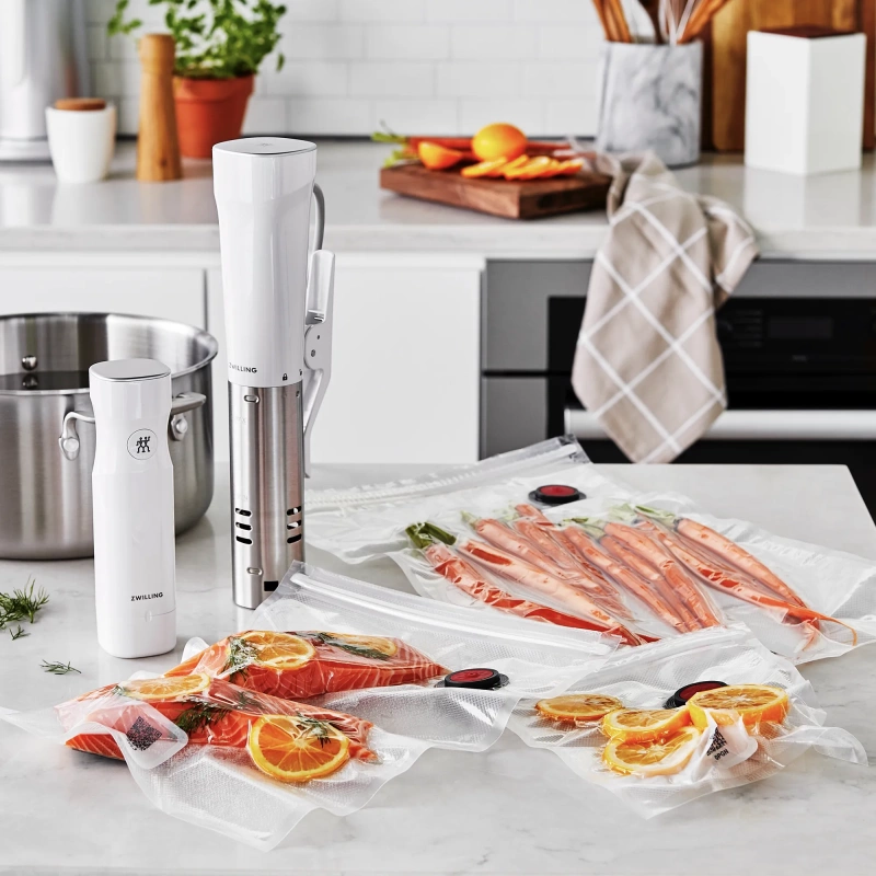 https://www.homethreads.com/files/zwilling/thumbs/1002490-zwilling-fresh-save-3-pc-large-vacuum-sealer-bags-2-14-gallon-reusable-sous-vide-bags-meal-prep-4.webp