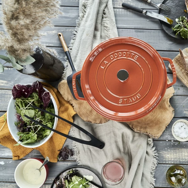 https://www.homethreads.com/files/zwilling/thumbs/11026806-staub-cast-iron-round-cocotte-dutch-oven-55-quart-serves-5-6-made-in-france-burnt-orange-7.webp