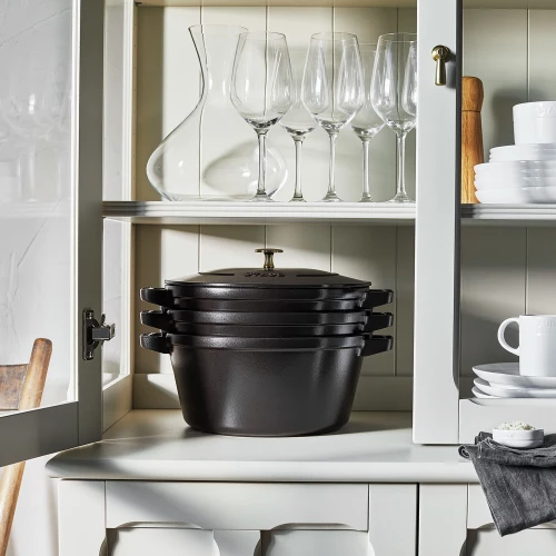 https://www.homethreads.com/files/zwilling/thumbs/14552623-staub-cast-iron-set-4-pc-stackable-space-saving-cookware-set-dutch-oven-with-universal-lid-made-in-france-matte-black-6.webp
