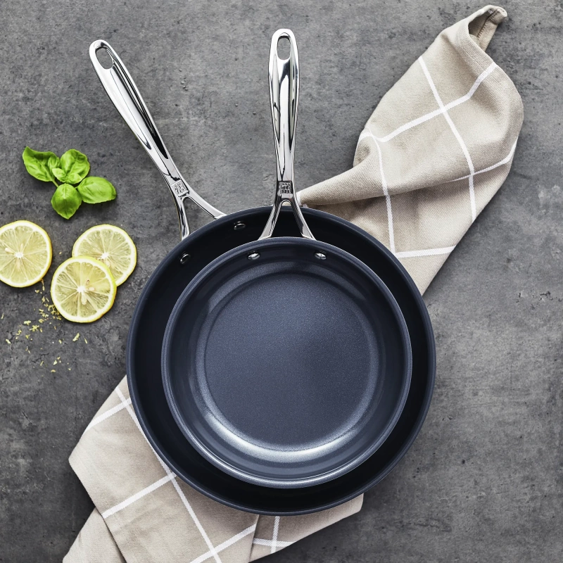 https://www.homethreads.com/files/zwilling/thumbs/66730-002-zwilling-clad-cfx-2-pc-stainless-steel-ceramic-nonstick-8-in-10-in-fry-pan-set-4.webp
